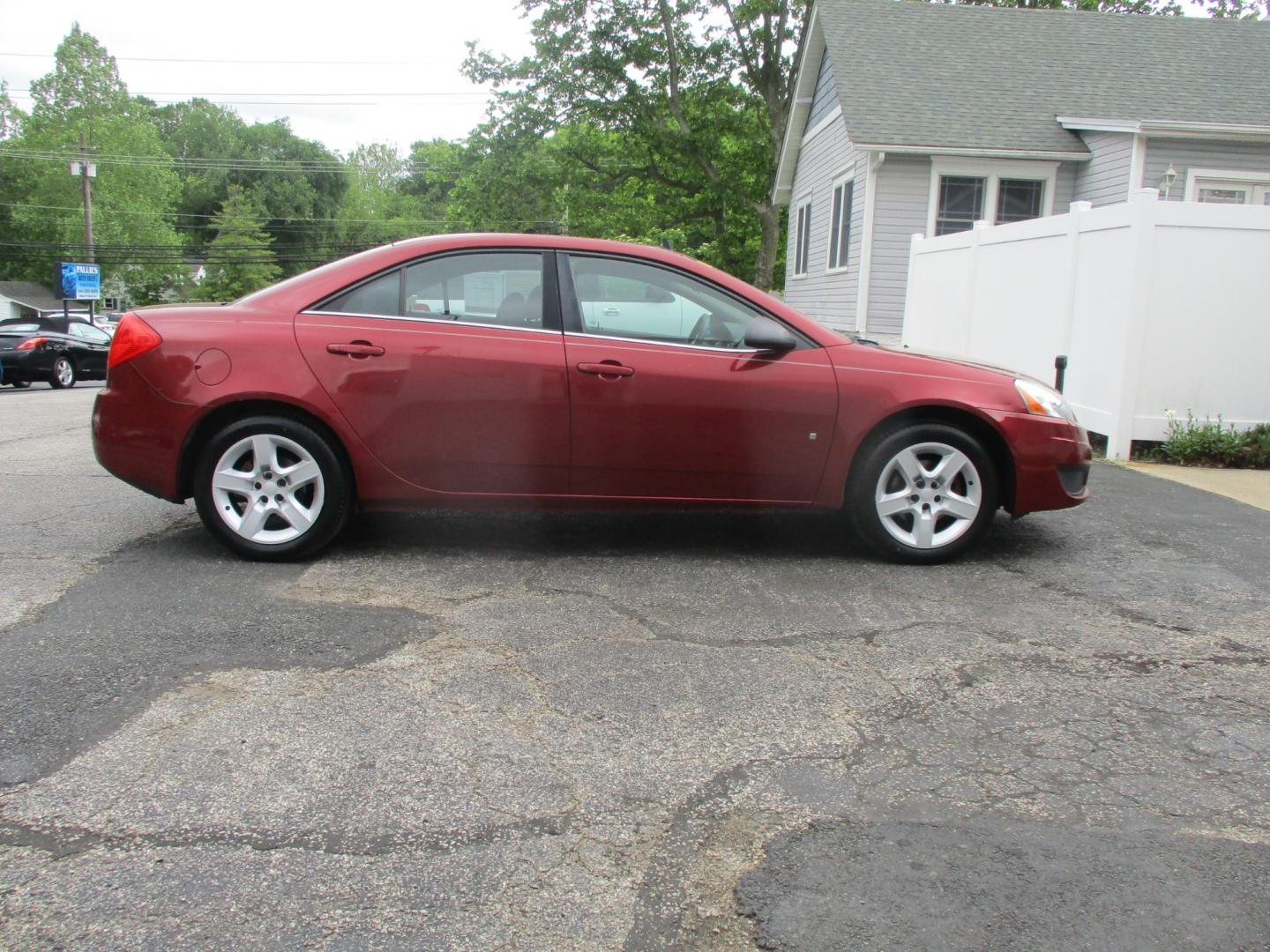 2009 RED Pontiac G6 Sedan (1G2ZJ57B994) with an 2.4L L4 DOHC 16V engine, 4-Speed Automatic transmission, located at 540a Delsea Drive, Sewell, NJ, 08080, (856) 589-6888, 39.752560, -75.111206 - Photo#8